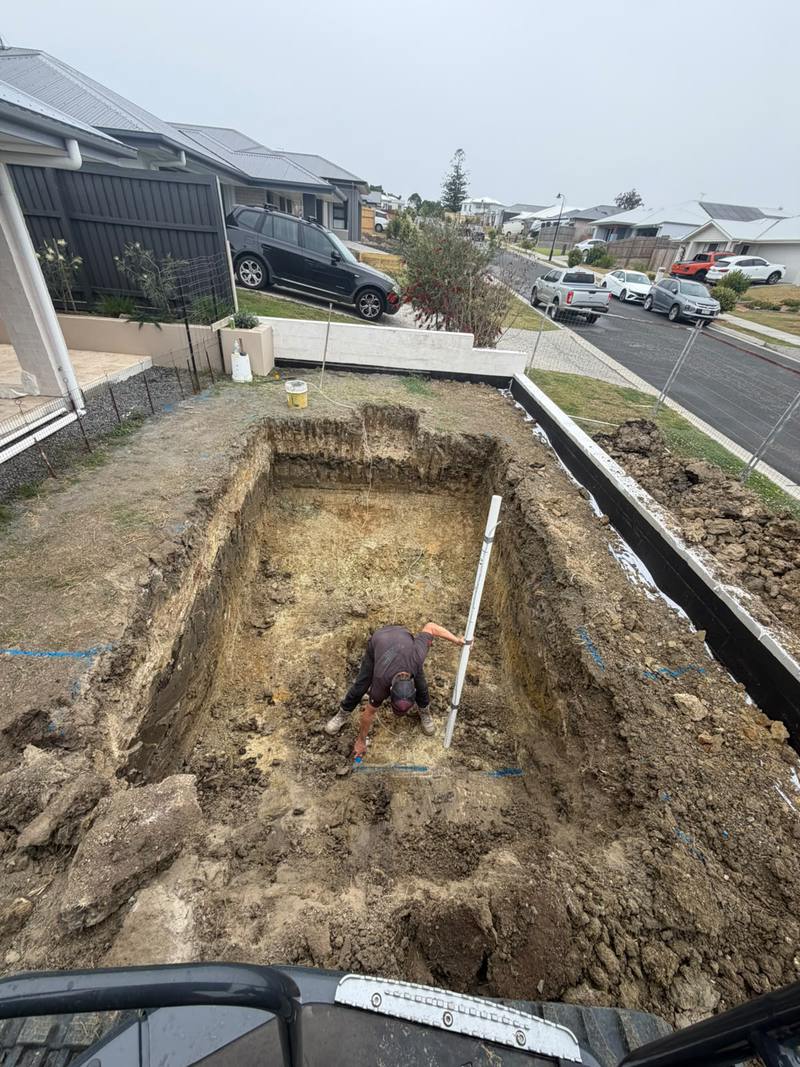 Checking levels at the bottom of the dig