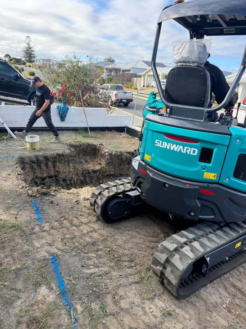 The 2.7T opening up the dig beside the house