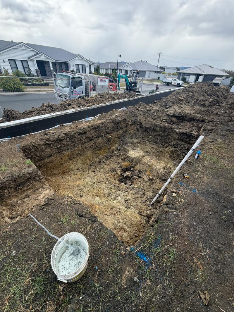 The dig from the street, truck standing by